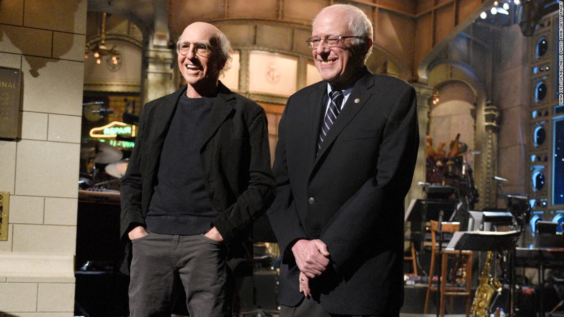 Comedian Larry David and Sanders &lt;a href=&quot;http://money.cnn.com/2016/02/07/media/bernie-sanders-larry-david-saturday-night-lvie/&quot; target=&quot;_blank&quot;&gt;appear together on &quot;Saturday Night Live&quot;&lt;/a&gt; in February 2016. David had played Sanders in a series of sketches throughout the campaign season.